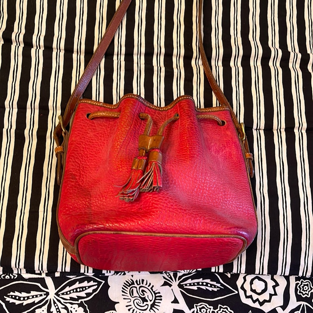 Fabulous red all weather leather vintage Dooney & Bourke drawstring bucket bag